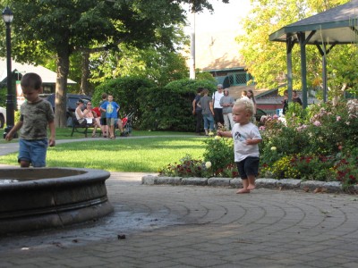 Lijah bringing something to throw in the fountain