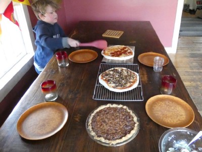 pecan pie and pizza on the table