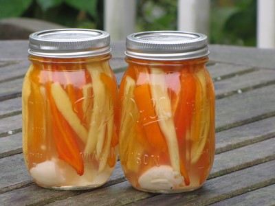 two jars of pickled peppers