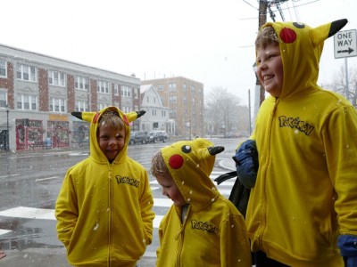 the boys, all in pikachu sweatshirts, in snowy Arlington