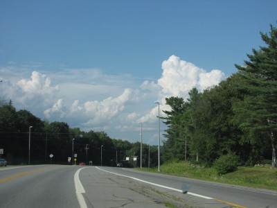 tall clouds over the road ahead