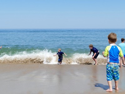 they boys playing in biggish waves