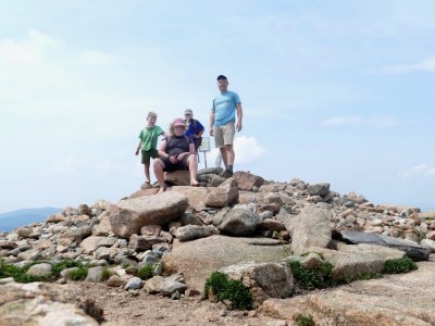 the four of us posing on top of Sargent Mountain