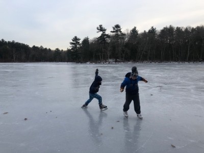Zion and Elijah skating on Fawn Lake