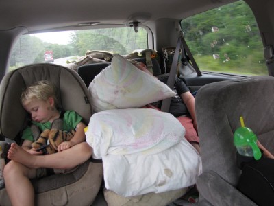 the boys asleep in the car