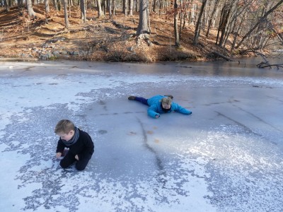 Harvey and Lijah sliding on the ice