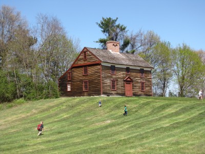 Harvey and Zion running up the lawn to the William Smith house