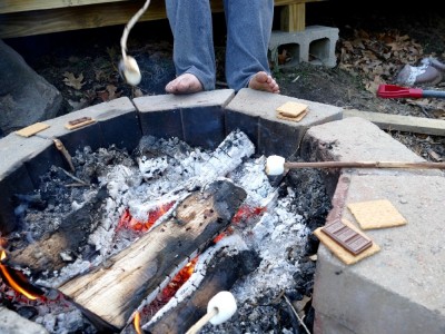 marshmallows roasting over our firepit (and some dirty toes warming up)