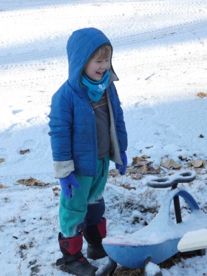 Elijah smiling at the first snowfall