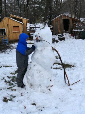 Harvey building a big snowman
