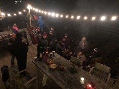 friends gathered on our back deck under lights