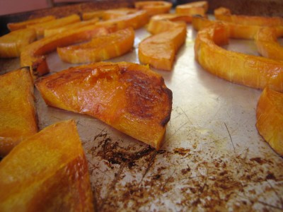 close-up of roasted squash on a baking sheet