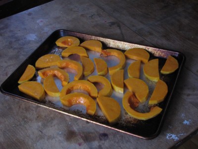 squash slices on a baking sheet
