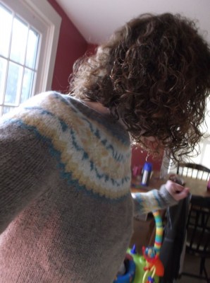 mama dancing in the kitchen in new sweater