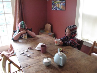Harvey and Lijah drinking tea in fuzzy PJs