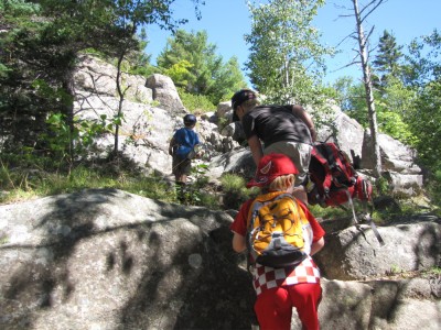Nathan, Zion, and Harvey climbing up the steep trail