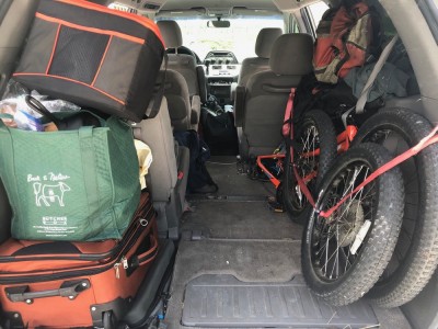 the van packed for the trip home, with bike wheels strapped to the right-hand wall