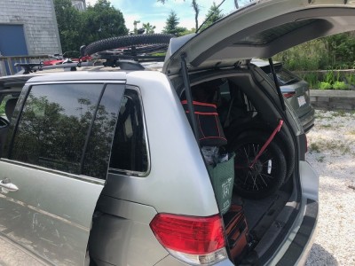 the van seen from the side with Zion's bike on the roof