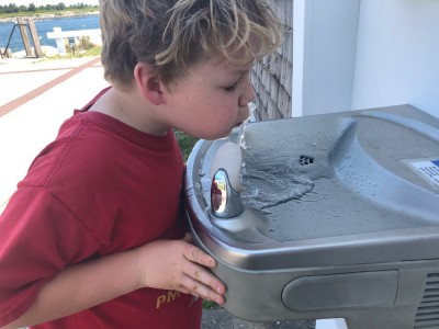 Zion drinking from a drinking fountain