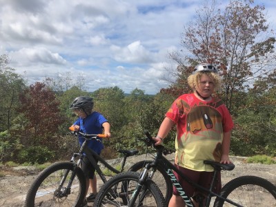 Harvey and Zion with their bikes atop Whipple Hill