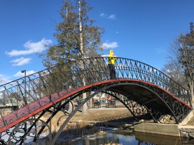 Harvey atop a very steep ornamental bridge in a park