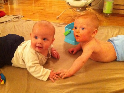 Zion and Nathan playing on the floor