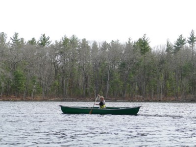 Zion paddling the canoe by himself