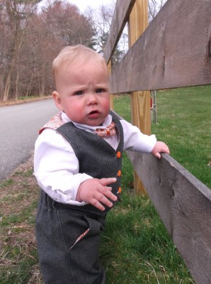 zion standing in his easter suit